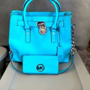 Micheal Kors large Hamilton satchel. Aqua blue color.